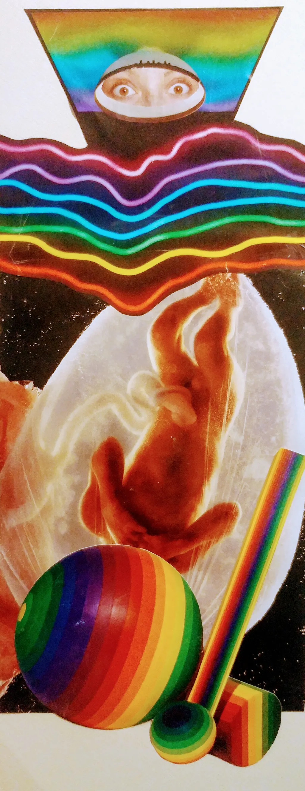 A tall collage: an eye at the top, rainbow bands, a figure in flame and a striped sphere
